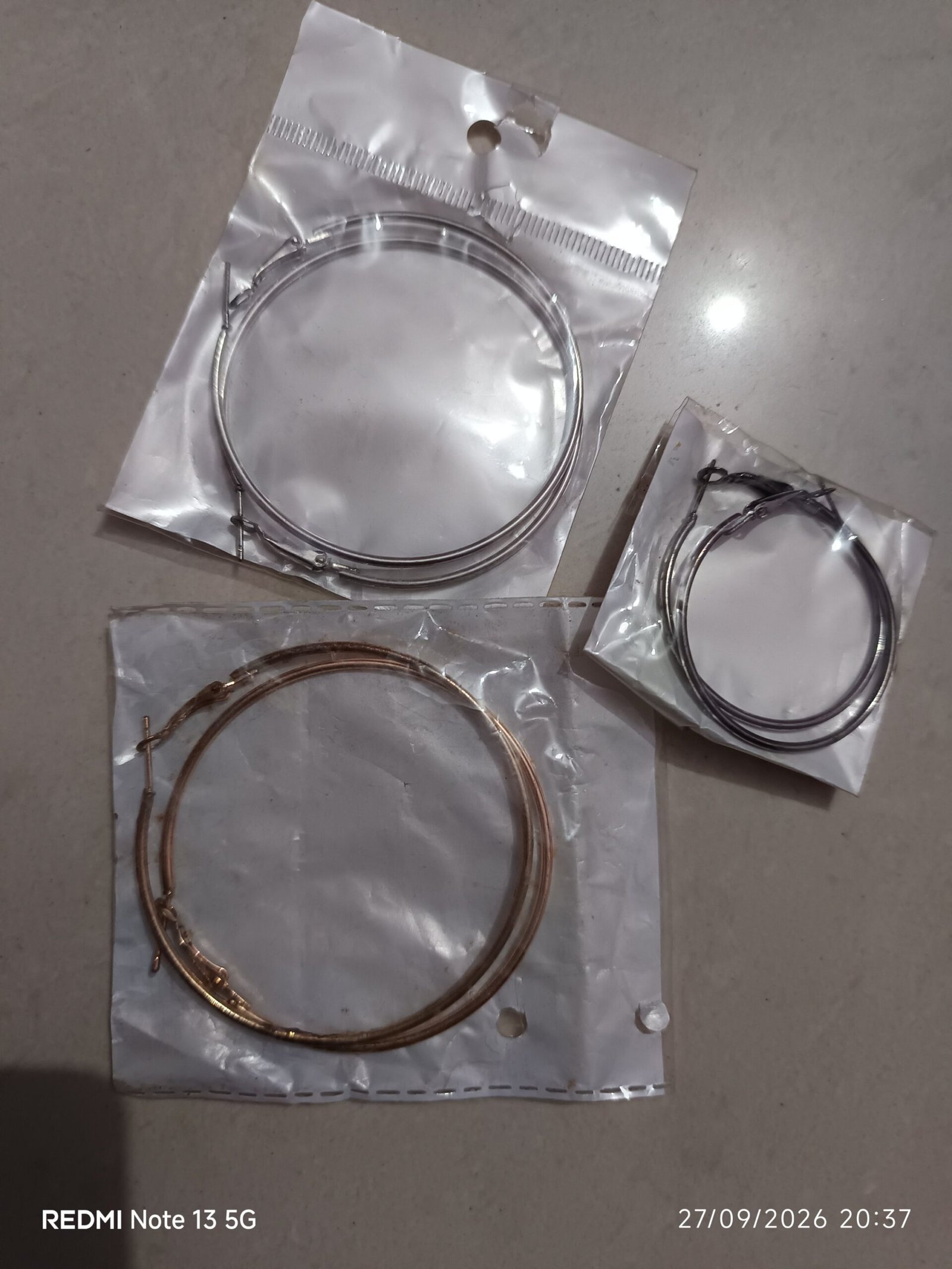 2026/09/JPEG_20260927_203746_3764053551081207619-scaled.jpg long earrings..all three single pieces available - Image 1