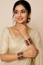 Maroon Embellished Bangle Set
Beautiful dark maroon bangles with golden detailing and sparkling stonework.